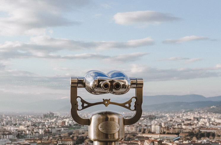 Binoculars looking out over a city