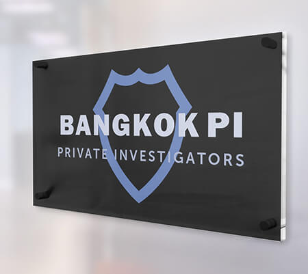 Bangkok Private Investigators logo on a plaque